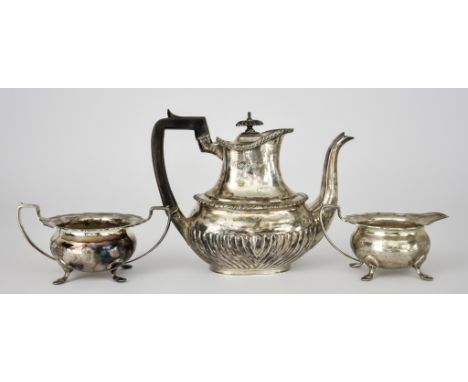 A Late Victorian Silver Rectangular Coffee Pot and a George VI Silver Sugar Basin and Milk Jug, the coffee pot by Mappin Bros