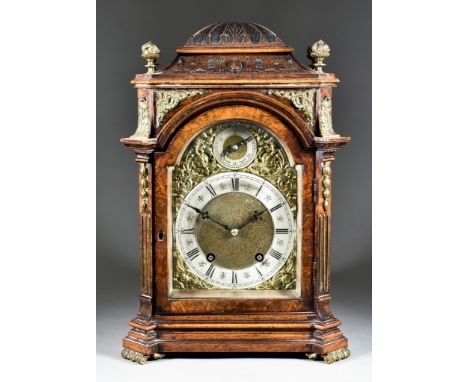 An Early 20th Century Walnut Cased Mantel Clock, by Lenzkirch, No. 72287, the 5.5ins arched brass dial with silver chapter ri