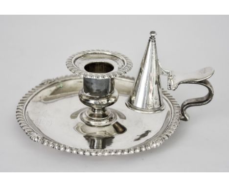 A Victorian Silver Chamber Candlestick, by Robert Hennell III, London 1843, with gadroon mounts and scroll handle, 2.5ins hig