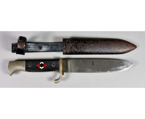 A World War II German Youth Dagger, 5.5ins bright steel blade marked RZ over M over M7/30, composite grips with enamel badge,