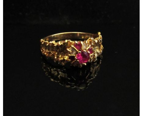 A gold ruby and diamond ring, stamped 18k. Size R, 4.2g