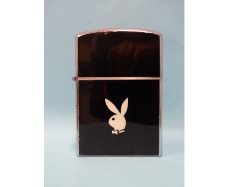 A Playboy outsize table lighter, the black enamel sides with Playboy bunny insignia, chrome sides, (some wear to sides and li