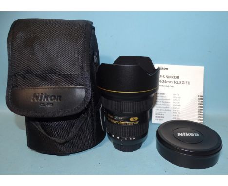 A Nikon AF-S Nikkor 14-24mm 1:2.8 G ED lens, serial no:545463, with user's manual and Nikon CL-M3 lens case.