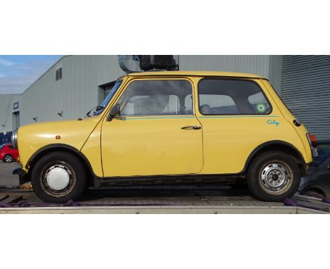A 1990 Rover Mini 1000 City E two-door saloon motor car, 1L engine, yellow paint, registration G198 PTT, approximately 90,000