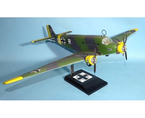 An approximately 1/30 scale model of a WWII Junkers Ju52 IZ-AR, with stand, 84cm wing span.