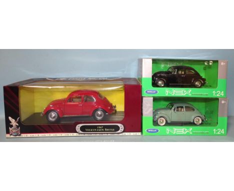 Road Signature, 1:18-scale, 1967 Volkswagen Beetle and two Welly Nex 1:24-scale Volkswagen Beetle models, (all boxed), (3).