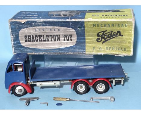 A Shackleton Mechanical Foden F. G. flat truck, mid-blue with red mud guards, c/w motor, (not presently working) and tools, (