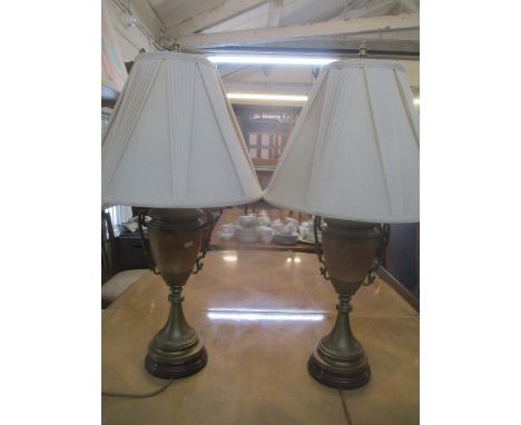 A pair of brass and painted vase design table lamps, with shades, 82cm h 