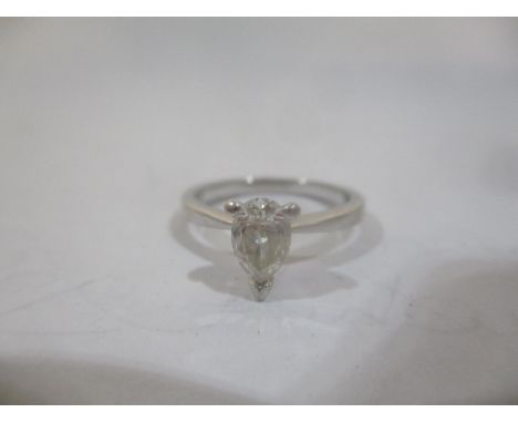 An 18ct white gold ring set with a pear shaped brilliant cut diamond, 0.46ct, colour 1, clarity S/I, size I/J, 2.6g with cert