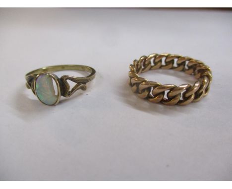 Two gold coloured rings, one set with an opal, damaged, 6.5g 