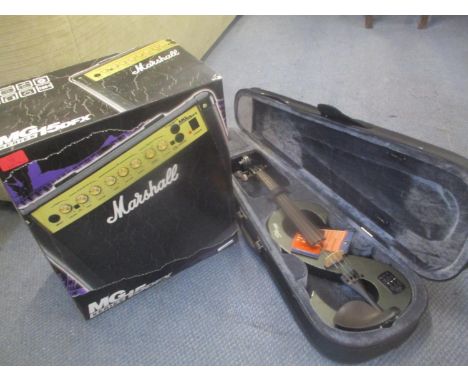 A Stagg electric violin and a Marshall MG 15DFX service amp 