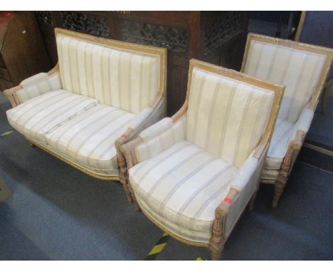 A Harrods Louis XV1 style part gilt beech framed open suite with carved ornament on turned legs, comprising of a two-seater s