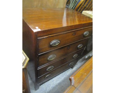 A George III straight fronted chest of four long, graduated drawers on bracket feet 86cm h x 69.5cm w 
