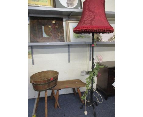 A 20th century rustic elm stool with The Tudor Rose carved in one corner, together with a mid 20th century wrought iron stand