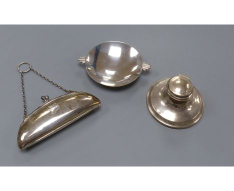  An Art Deco silver nut dish with fan shaped handles, Birmingham, 1934, 11.5cm, a silver purse and a silver inkwell.
