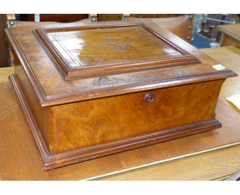   A large Polyphon walnut table top musical box, playing thirty 39.5cm discs