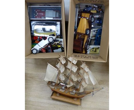  A collection of Matchbox, Dinky and other model cars and other toys