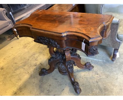   A 19th century continental folding rosewood card table, width 92cm, depth 46cm, height 80cm