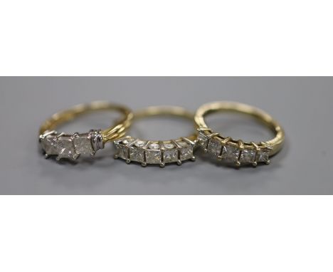   Two modern 9ct gold and five stone diamond set half hoop rings, sizes N &amp; R/S gross 6.4 grams and a similar 14ct gold a