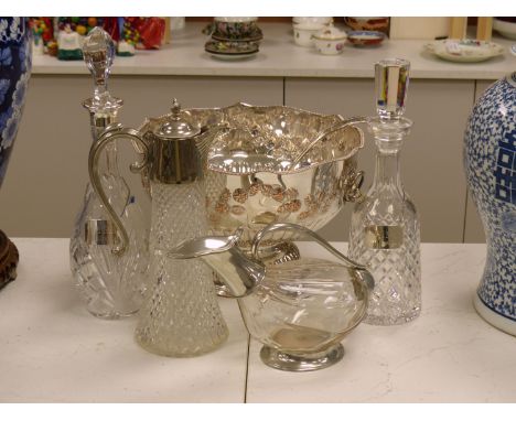   Two cut glass decanters (one silver-mounted), two silver Whisky and Gin labels, an 'Etains du Manoir' duck shaped wine cara