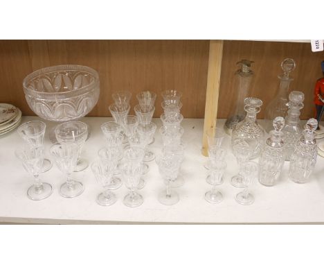   A cut glass punch bowl and a collection of table glassware, to include a late Victorian silver mounted decanter (lacking st