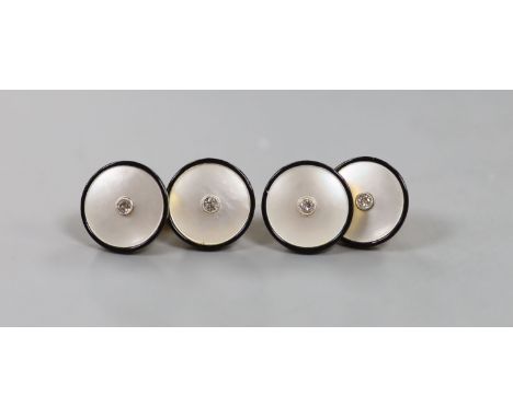   A cased pair of 18ct, mother of pearl, black enamel and diamond set circular cufflinks,diameter 12mm, gross weight 7.7 gram