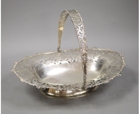   An Edwardian pierced silver oval cake basket, by Josiah Williams &amp; Co, London, 1907, 35.2cm,25.5oz.
