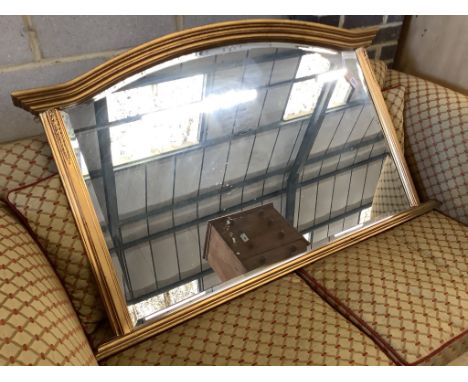   A reproduction gilt overmantel mirror, width 122cm, height 77cm