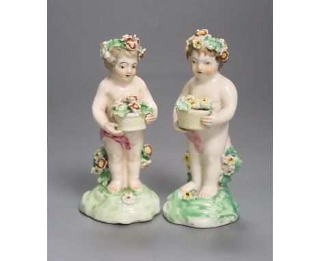   A good pair of Derby figures of children holding baskets of flowers c. 1760, patch marks, firing crack to one arm, height 1