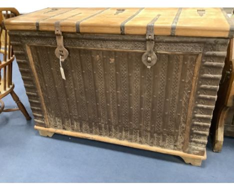   An Indonesian iron bound hardwood trunk, length 122cm, depth 54cm, height 86cm