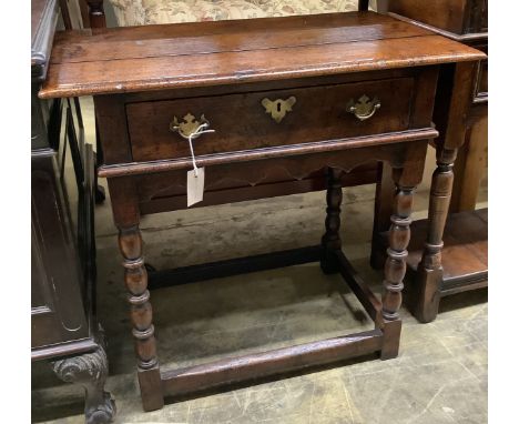   A 17th century style oak side tablefitted single drawer on bobbin-turned supports joined by stretcher, width 76cm, depth 45