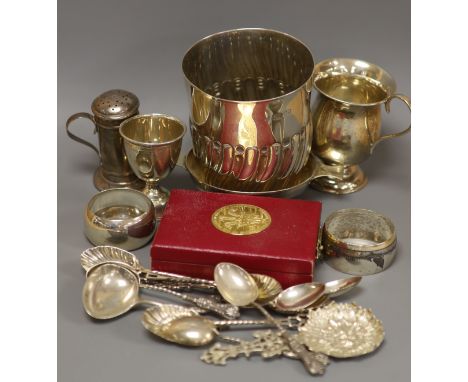   A Victorian silver half-fluted cylindrical vase, a small pedestal cup, a quaich, a Prince of Wales caddy spoon and other si