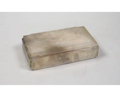   A George VI Art Deco engine turned silver cigarette case, by Walker &amp; Hall, Chester, 1939,the lid with interior engrave