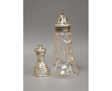   A modern silver pepper mill, Mappin &amp; Web, Sheffield, 1957, 85mm and silver plated mounted glass sugar sifter.