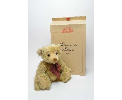 A Steiff ‘Year 2000’ Teddy Bear, ‘blond 43’, no. 2207, with box and certificate. 