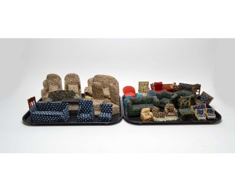 A collection of dolls house lounge suites and other upholstered chairs, of various styles and designs.PROVENANCE: From the es