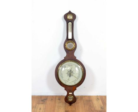 A 19th Century rosewood wheel barometer, with a label for J &amp; H Taylor, Optician, Birmingham, the thermometer over the ci