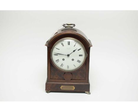 An early 20th Century French dome cased mantel clock, retailed by Edward Glasgow, the case with applied brass presentation pl