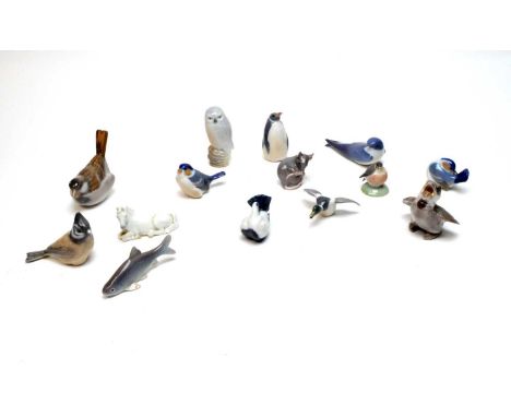 A collection of Danish ceramic bird figures, including: Royal Copenhagen penguin figure; Royal Copenhagen duck; Royal Copenha
