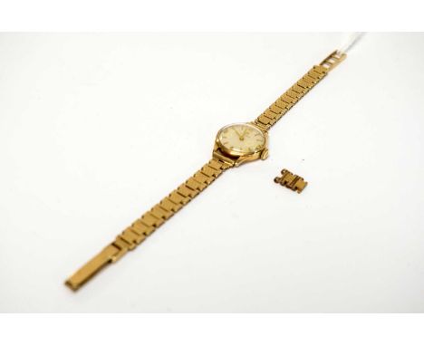 A 9ct yellow gold Omega cocktail watch, fitted manual wind movement, on gold strap. 