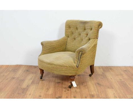 An attractive Victorian button-back nursing chair, upholstered in a lined multi-coloured fabric, the scroll over top over a b