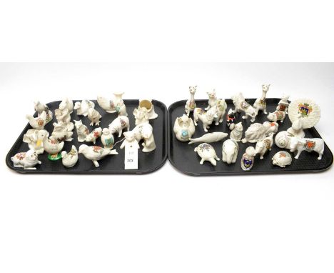 A collection of crested ceramic wares, most formed as animals, by makers including: Caledonia Heraldic China; Arcadian; Graft