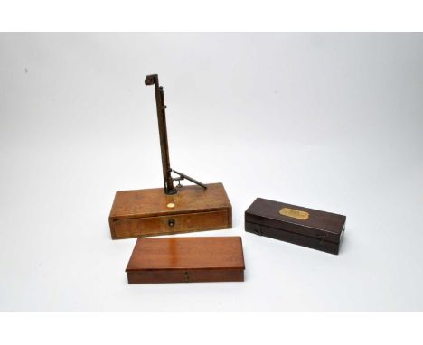A Sikes’s Hydrometer in case; a H.M. Stanley Precision Balances set of scales; and another travelling set of scales, in case 
