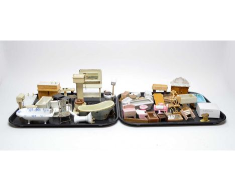 A collection of vintage dolls house bathroom furniture, including: ceramic baths; ceramic toilets with pull chains; a painted