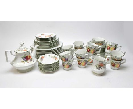 A Johnson Brothers Staffordshire tea and dinner service, decorated with fruiting foliage and green borders, including: a tea 
