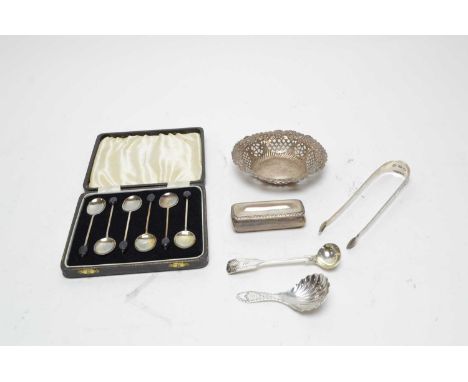 A selection of silver items, to include: a shell bowled caddy spoon, by Brook &amp; Son; a pair of Irish Georgian sugar tongs