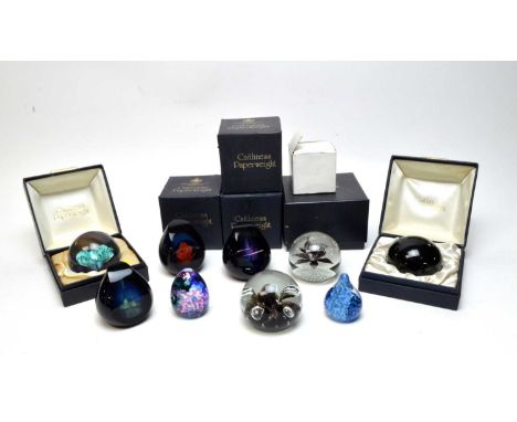  Three boxed Caithness glass paperweights, together with six smaller Caithness glass weights, four with cardboard boxes.