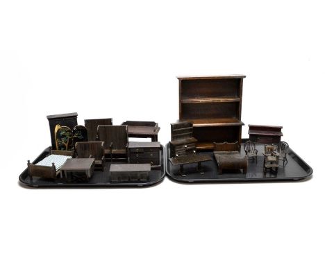A collection of vintage ebonised wood dolls house furniture, including: a double bed with blue and white striped mattress; an