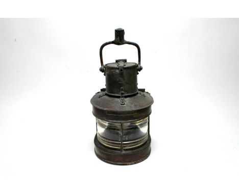 A vintage marine nautical ships lamp, with faint impressed makers mark, likely Player Mitchell Birmingham, 42cms high includi