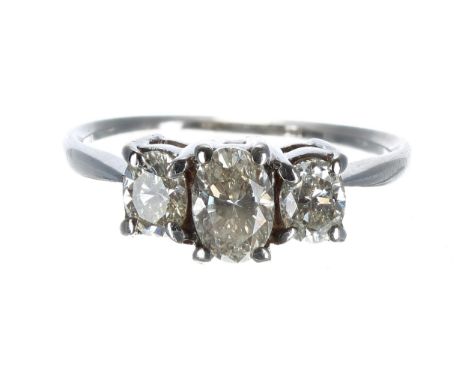 18ct white gold three stone diamond ring, 1.10ct approx in total, clarity VS-SI, colour J/K, 3.3gm, width 7mm, ring size N 